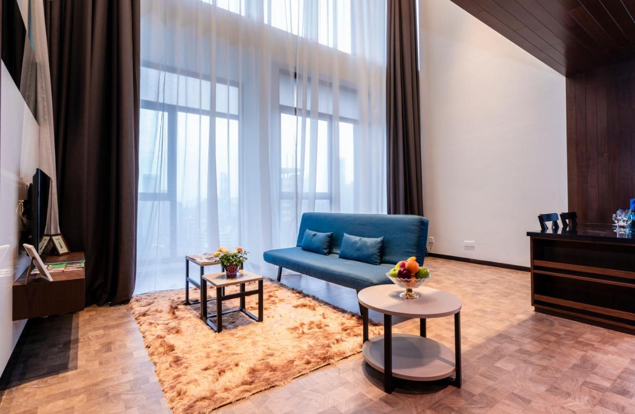 Expressionz Professional Suites By Mykey Kuala Lumpur Exterior foto A living room in a serviced apartment in Kuala Lumpur, Malaysia.